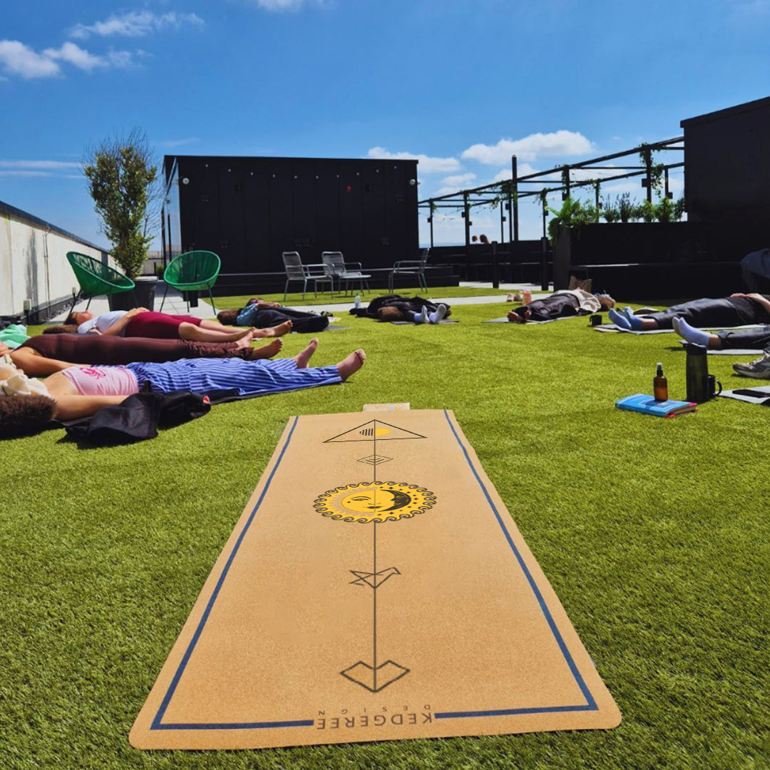 Outdoor yoga session with ultra light travel cork mat – sun and moon design for alignment, lightweight and perfect for travel.