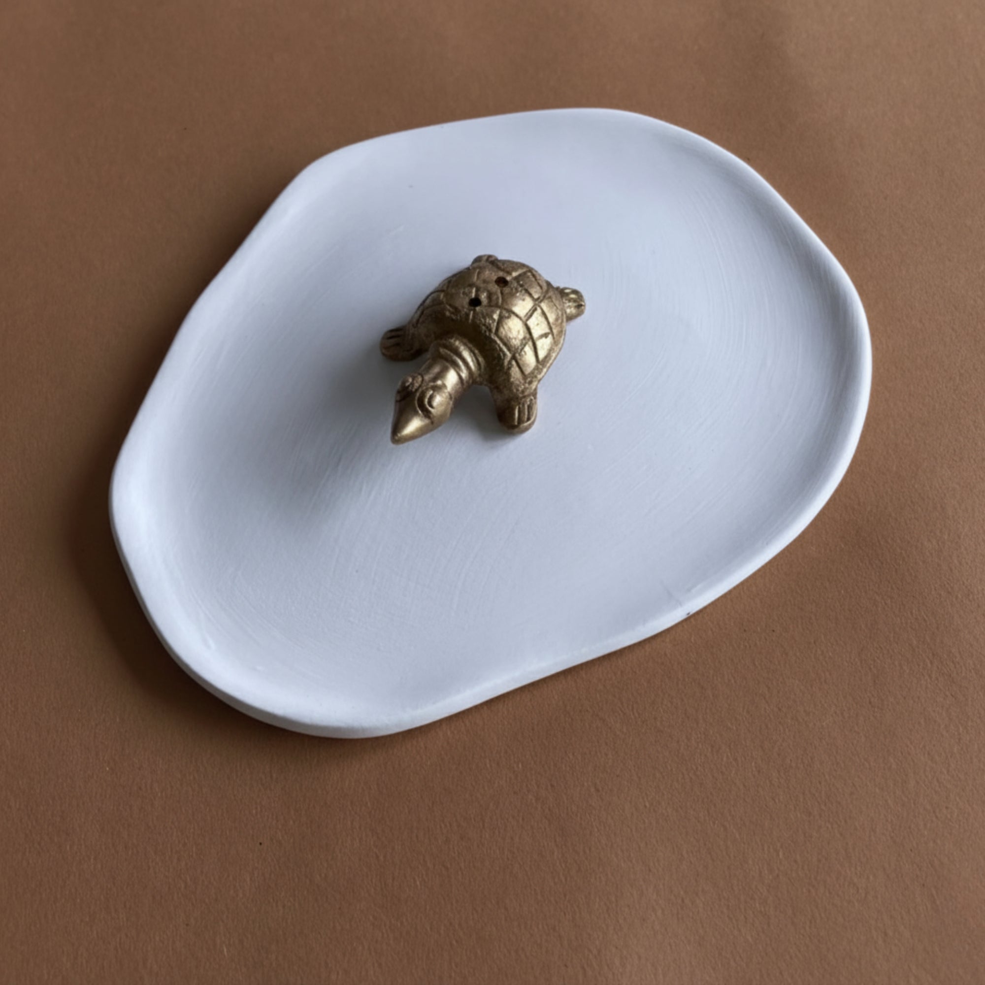 Mykonos-inspired white tray with brass turtle incense holder—gift set for rituals.
