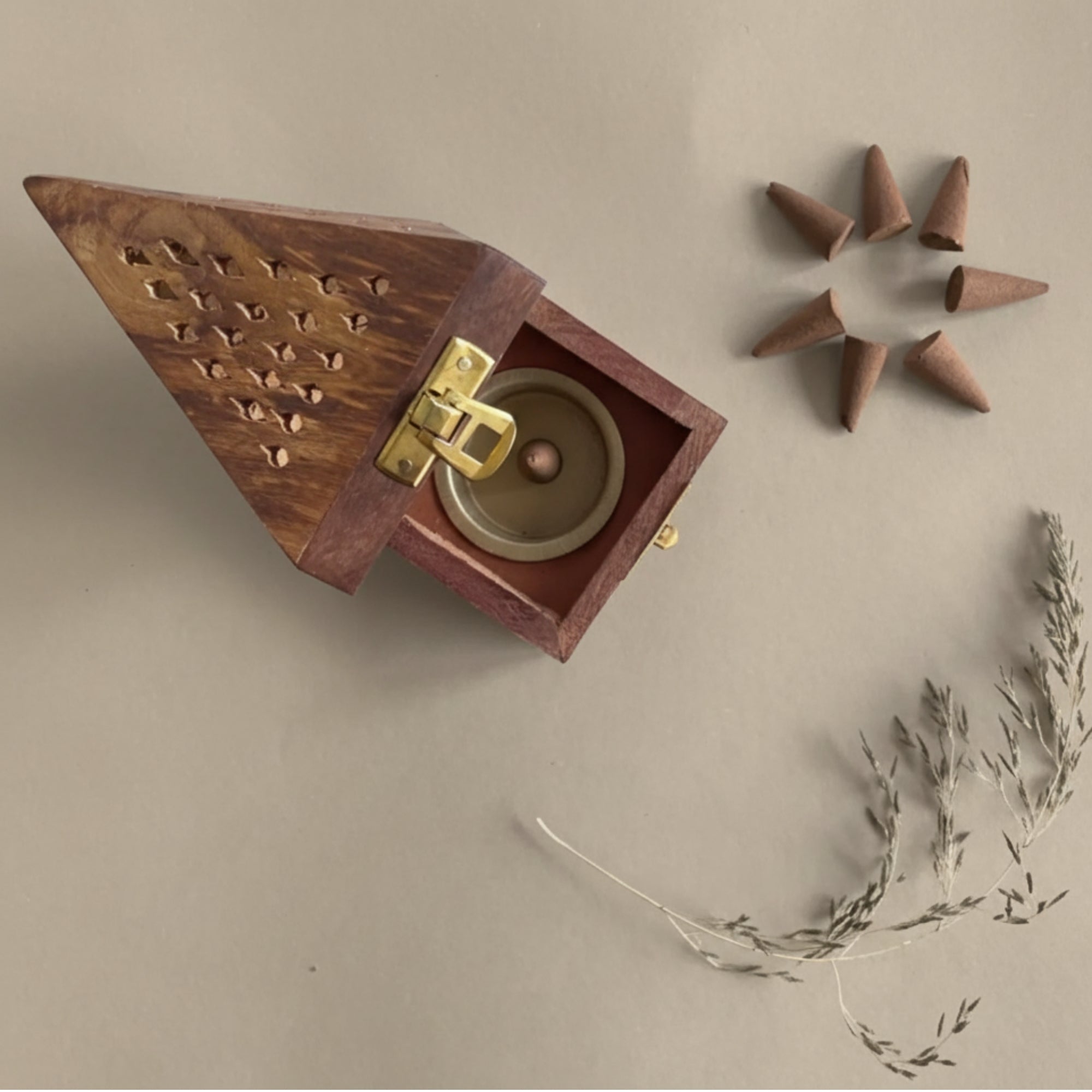 Triangle wood incense cone holder—minimal ash catcher.