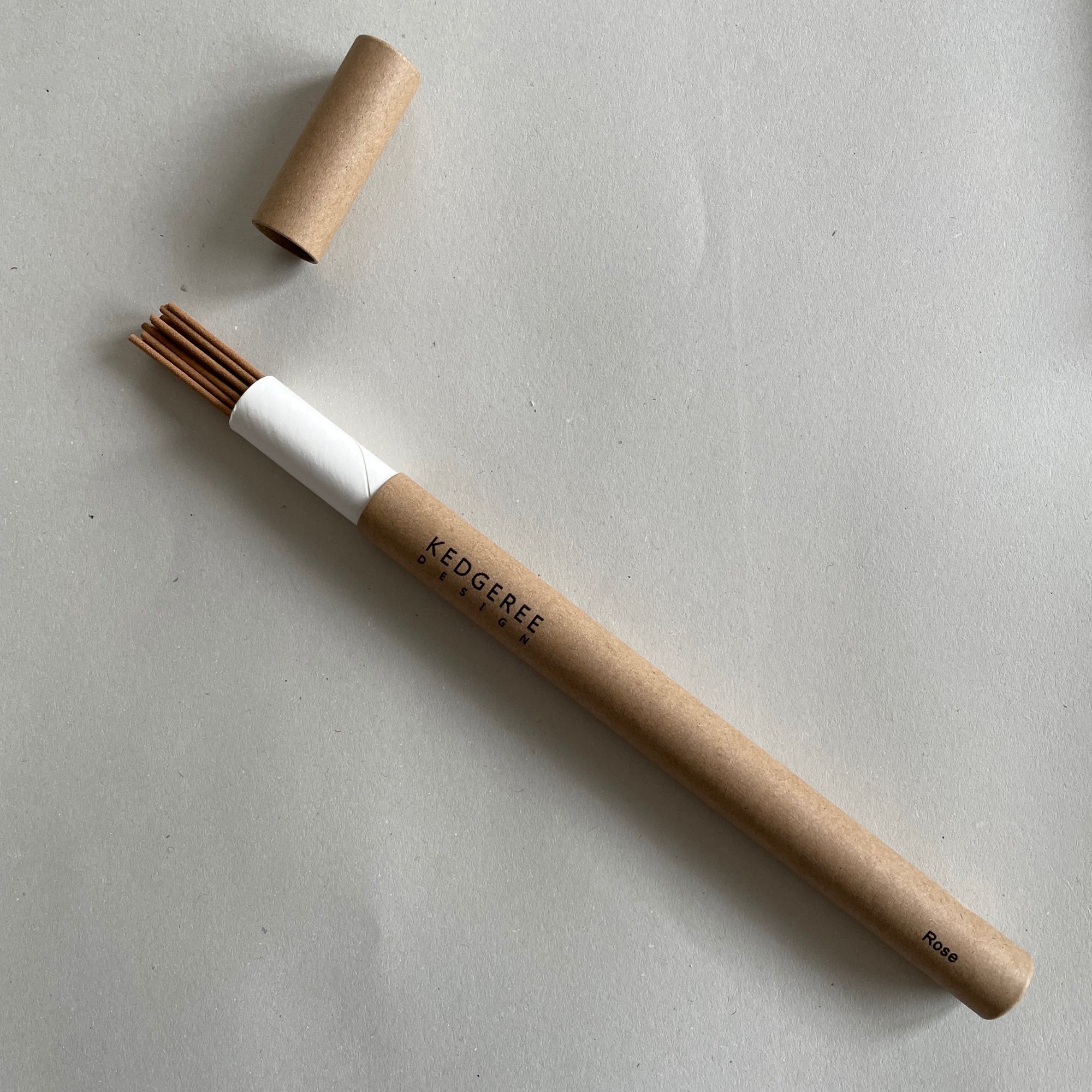 Kedgeree incense sticks with natural rose fragrance on a gray background