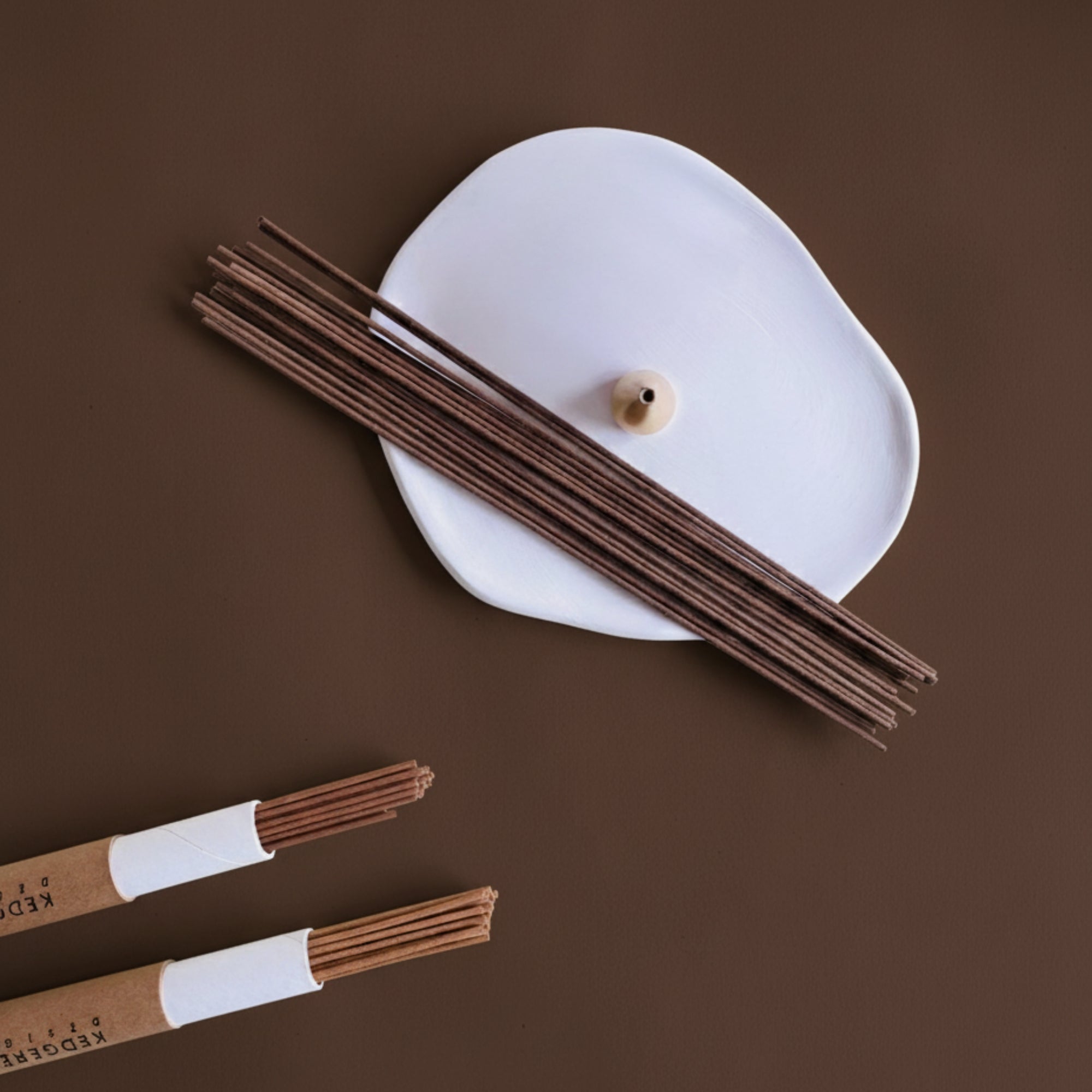 Happy Mood incense set with brass holder and white ceramic tray—agarwood, rose & sandalwood sticks.