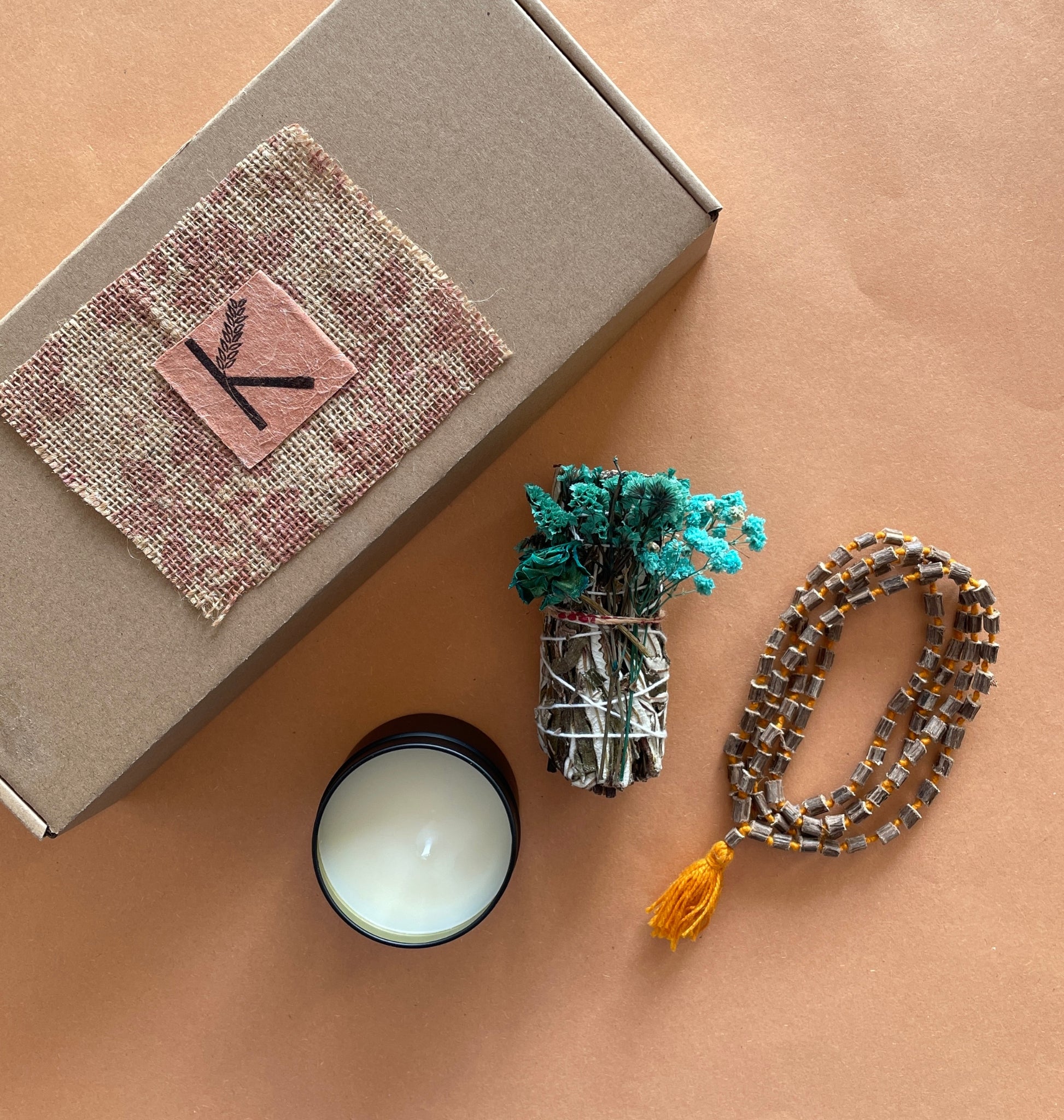 Smoke Cleansing Box with white sage, blue sage, Yerba Santa, tulsi mala, sandalwood incense, and mini soy candle in a handmade gift box