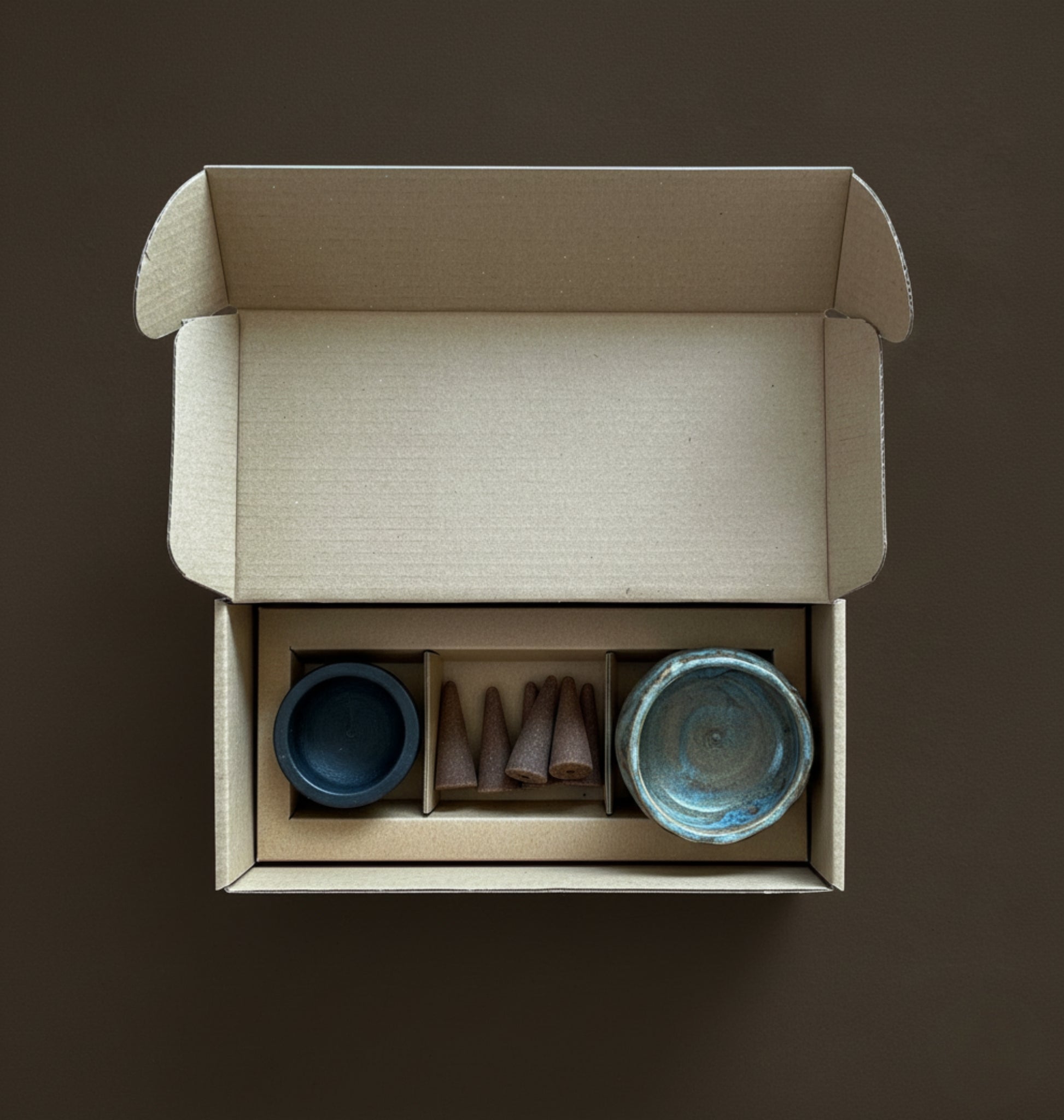 Incense Cone Box with 15 natural cones and a handmade ceramic burner in two colour options.