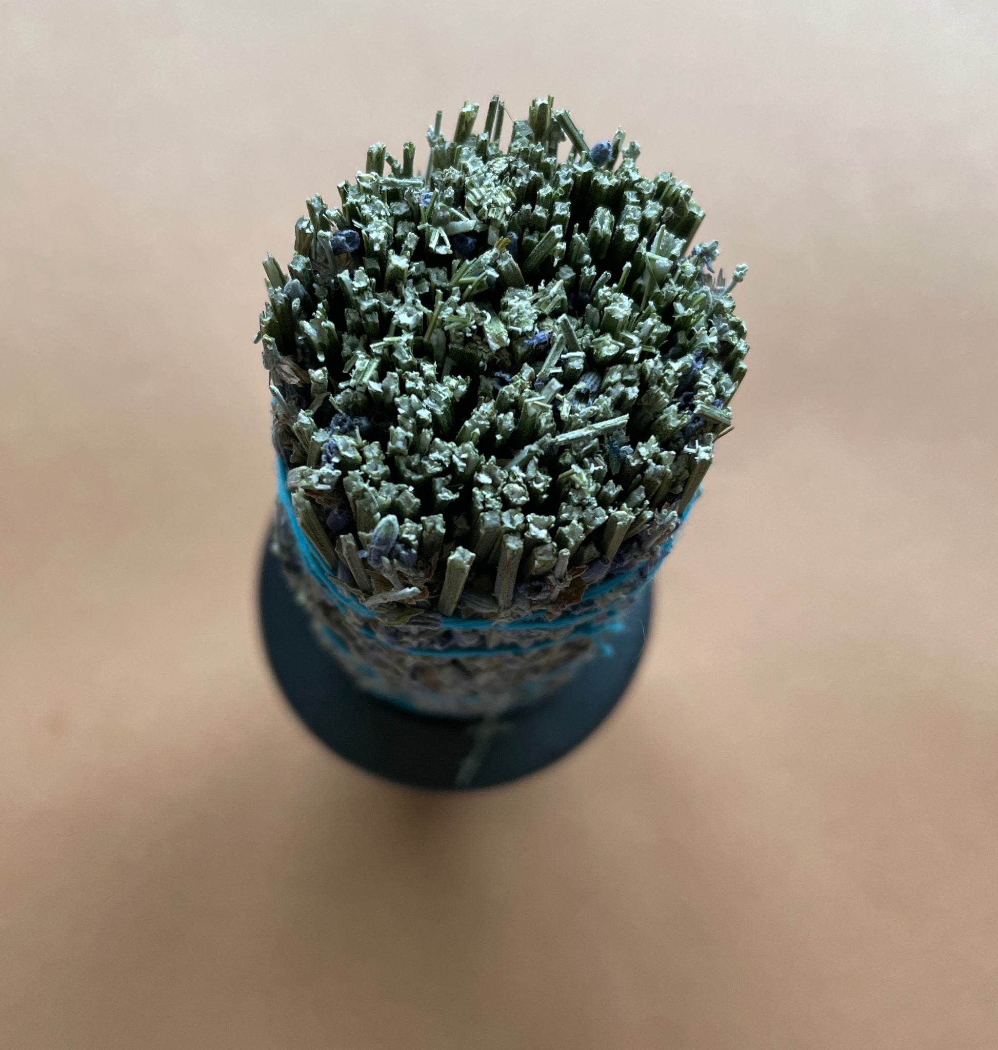 Lavender Smudge top shot against a brown background