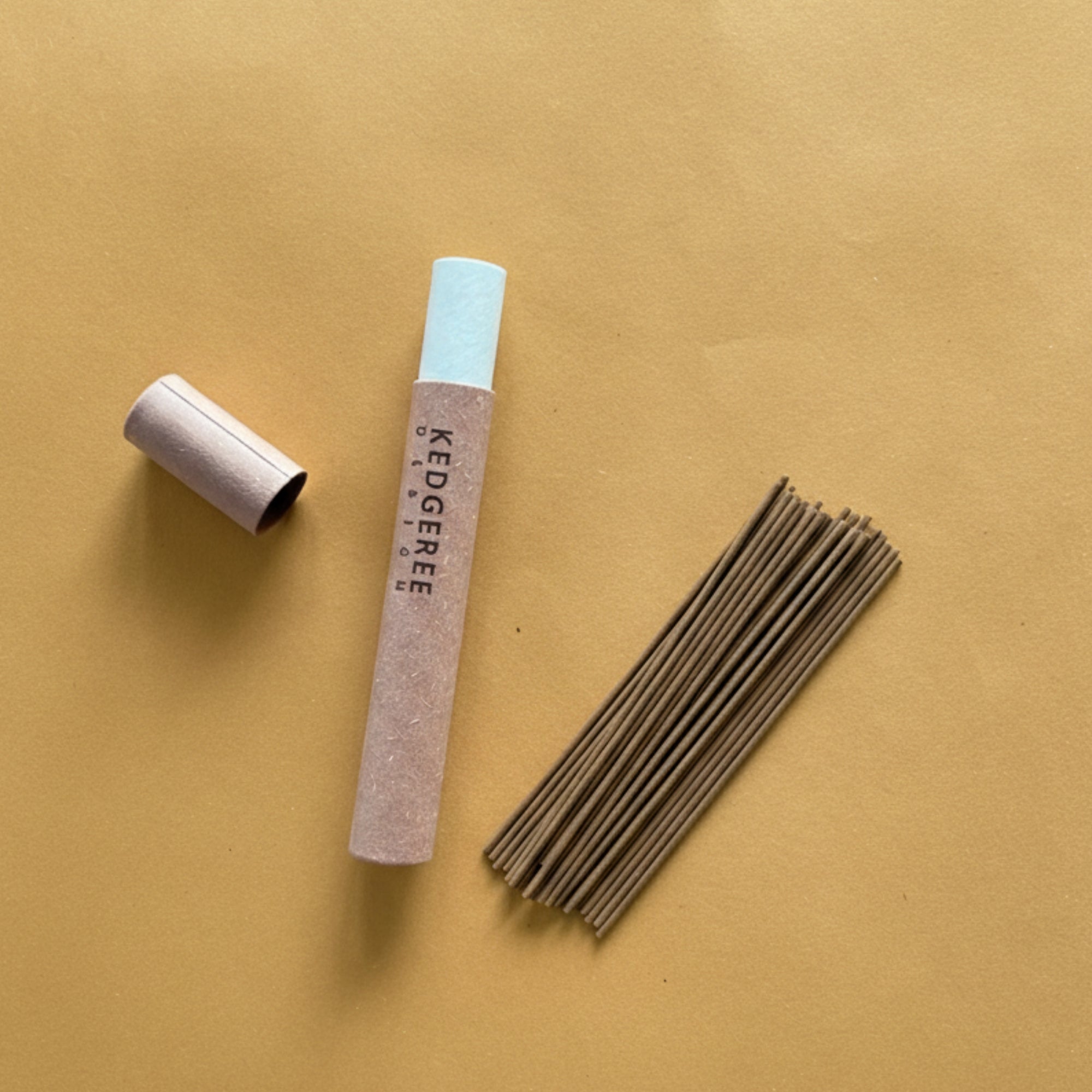 Kedgeree natural incense sticks with beautiful packaging tube box on a beige background