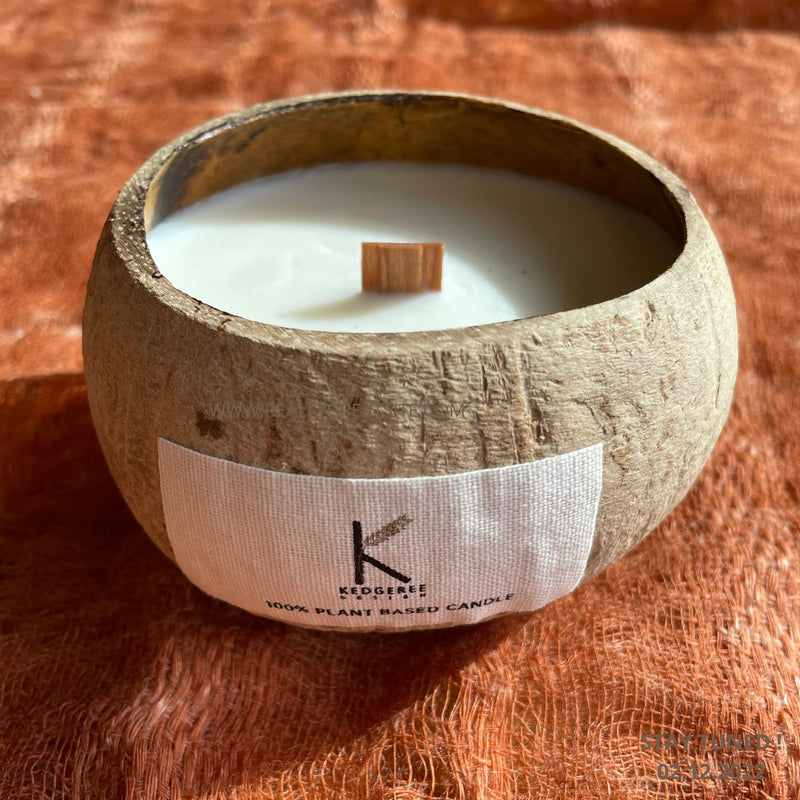 Close-up of the wooden lid of the Mumbai Spice Market coconut shell candle.