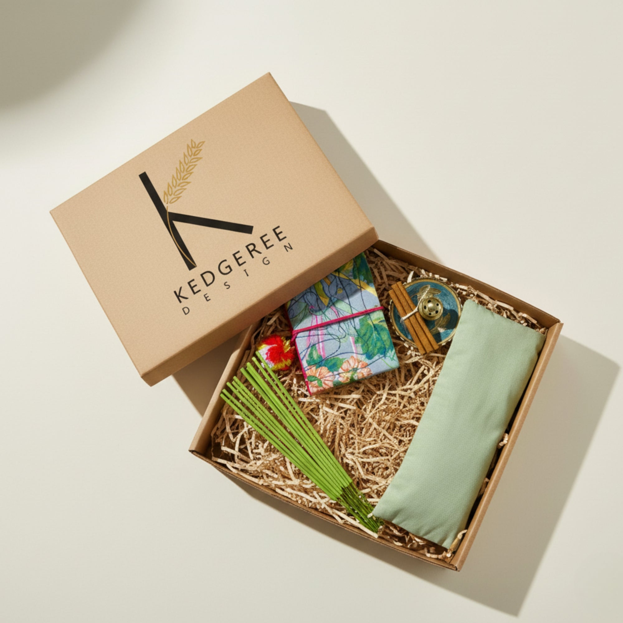 The Slow Sunday Gift Set with lavender and flaxseed filled eye pillow, natural incense sticks , handcrafted brass holder and meditation journal made from recycled fabric