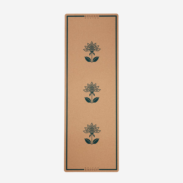 Full-size cork yoga mat with lotus flower design.