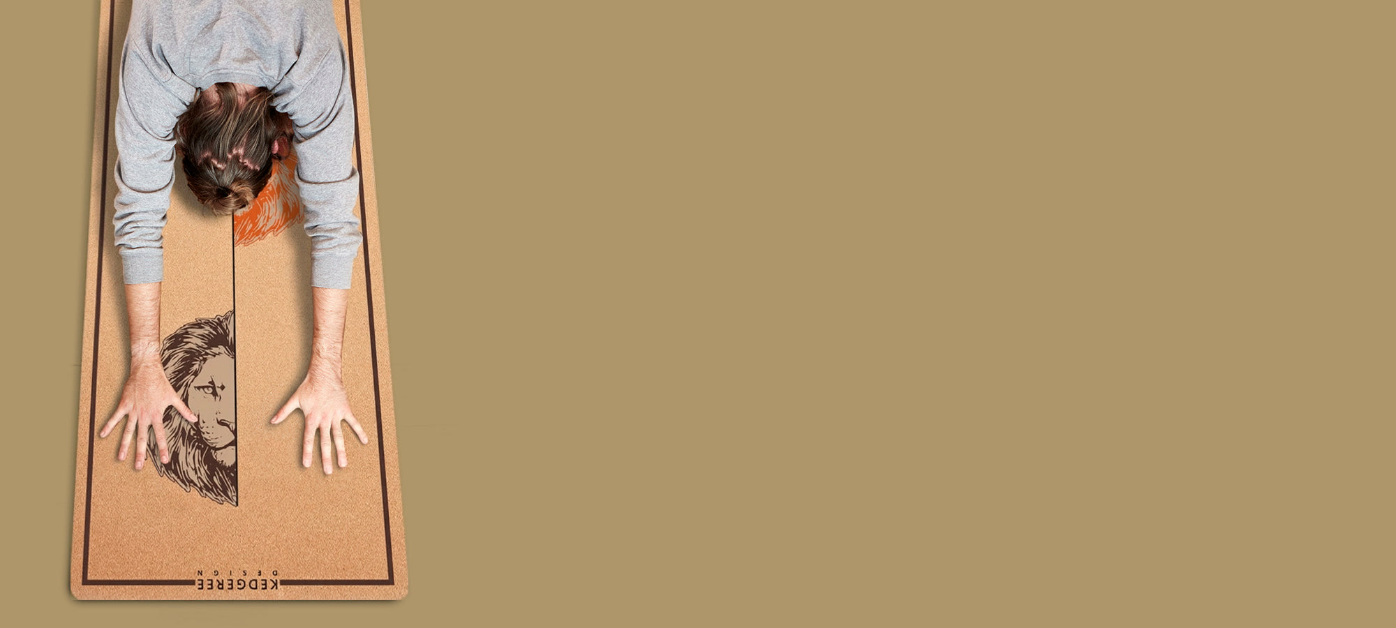 Person standing on a cork yoga mat with a lion design, on a beige background