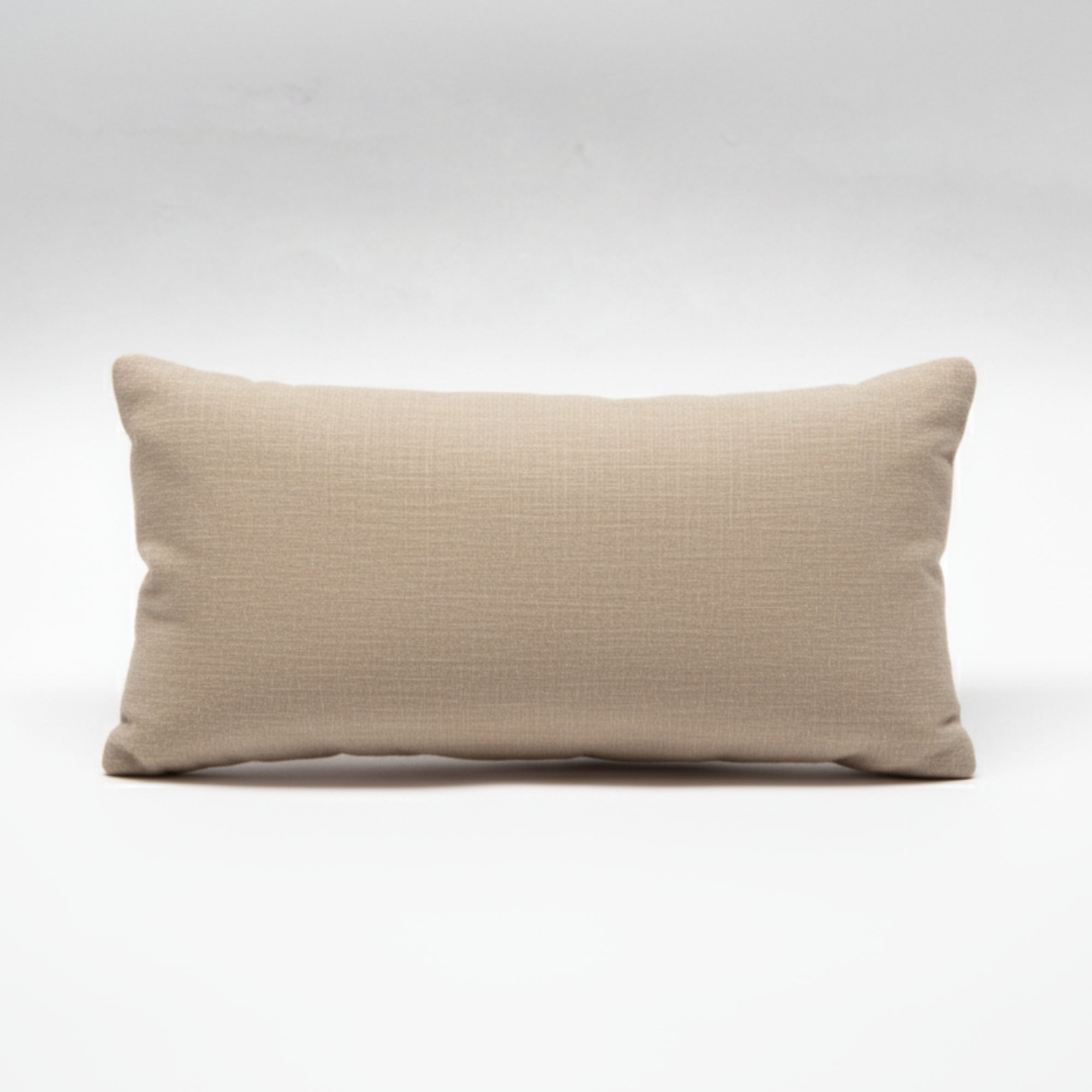 Grey yoga and meditation eye pillow on a white background