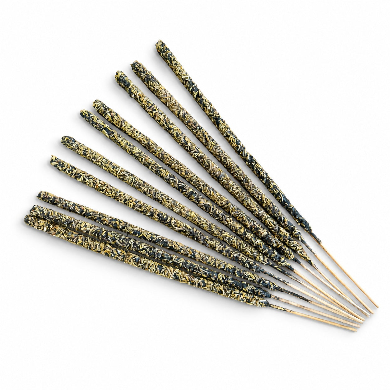 Eucalyptus hand rolled incense sticks laid in a white backdrop