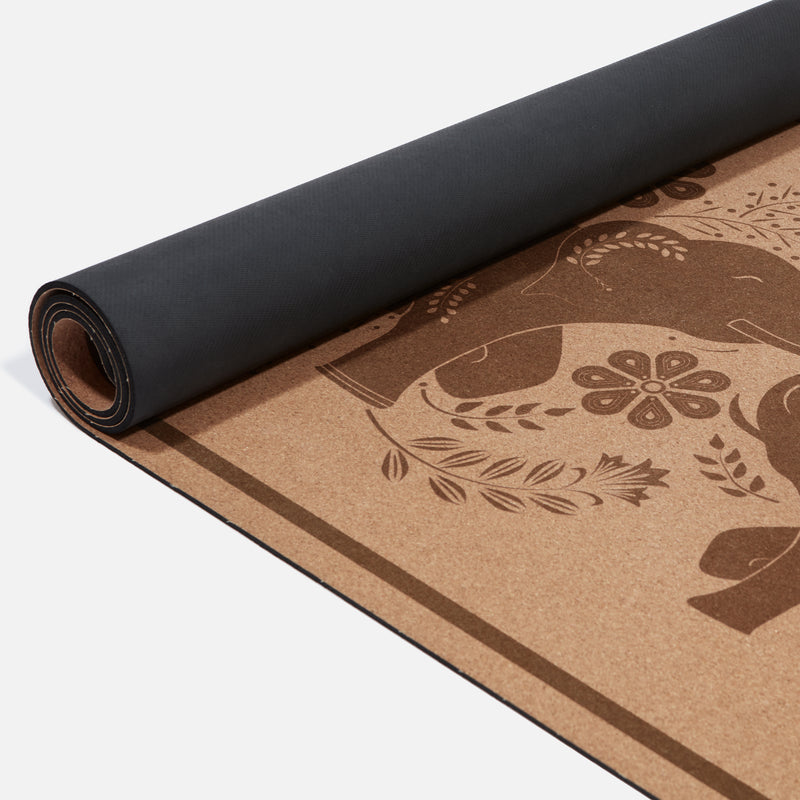 Cushioned cork yoga mat with elephant design for extra support and comfort